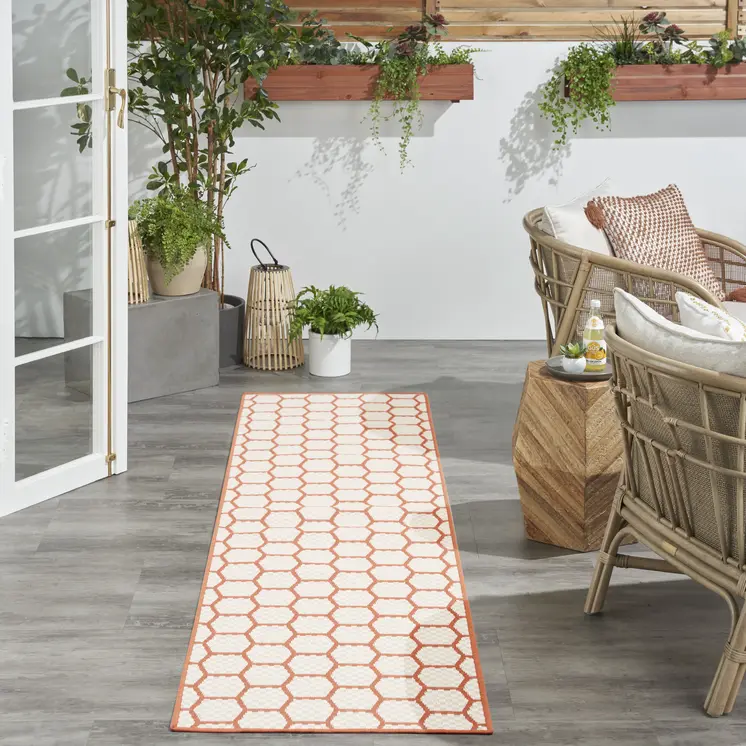 8' Coral And Ivory Geometric Indoor Outdoor Runner Rug