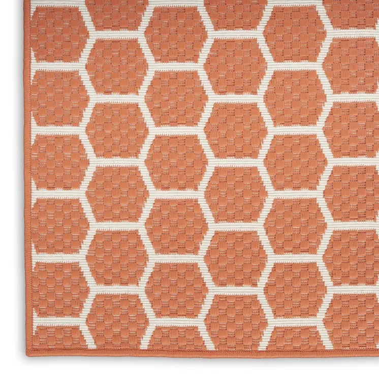 10' Coral And White Geometric Indoor Outdoor Runner Rug