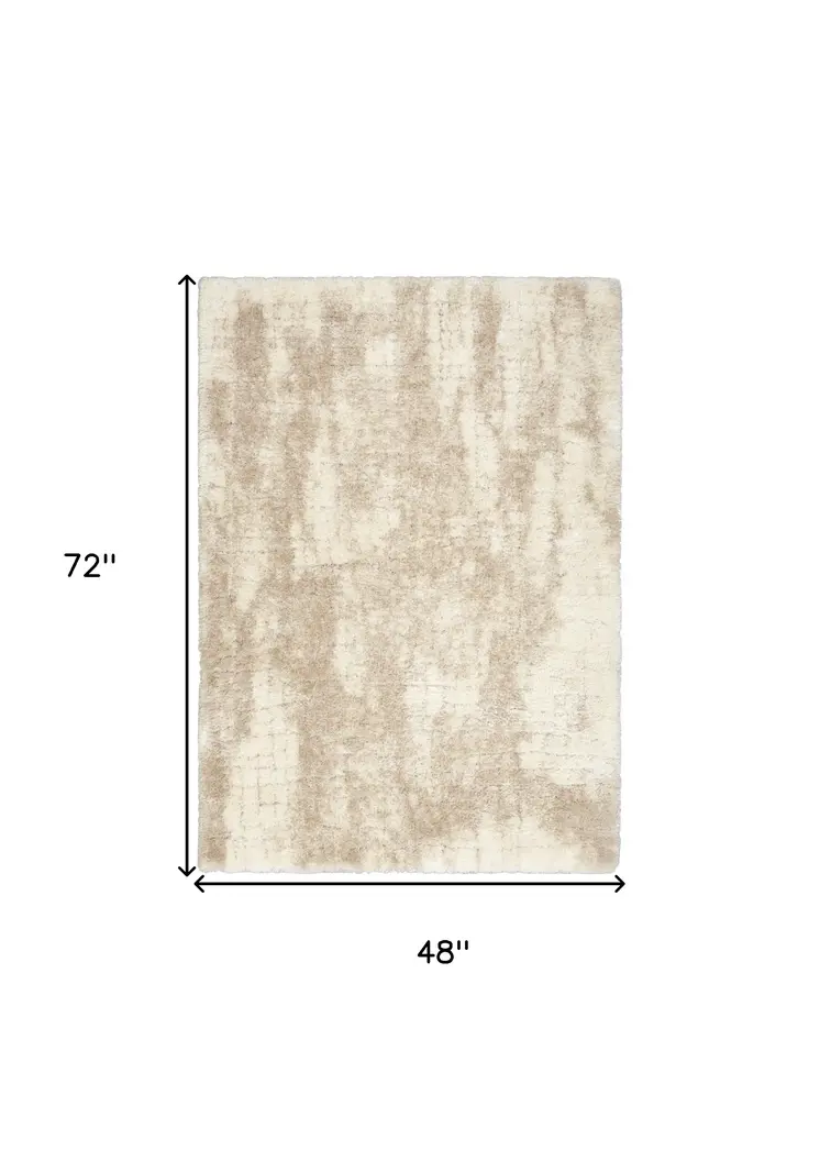 4' X 6' Beige and Ivory Abstract Shag Area Rug