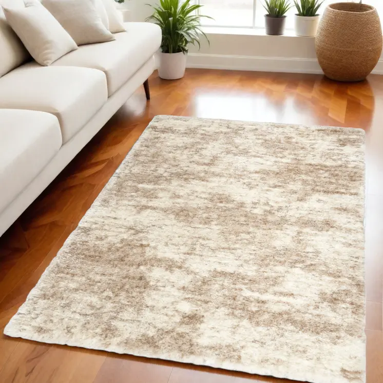 5' X 7' Beige and Ivory Abstract Shag Area Rug