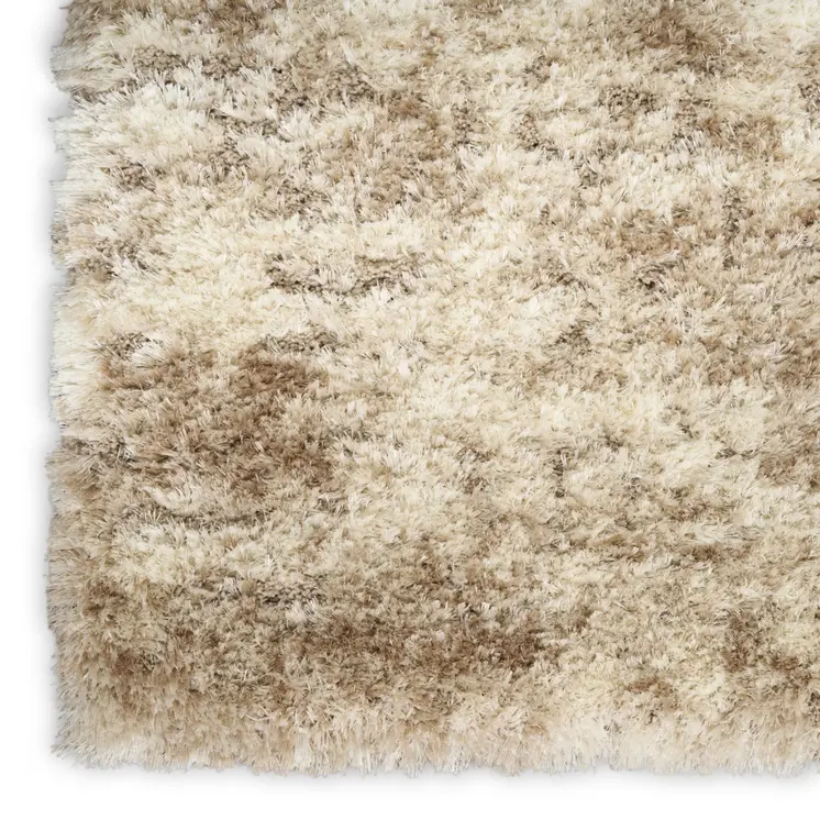 5' X 7' Beige and Ivory Abstract Shag Area Rug