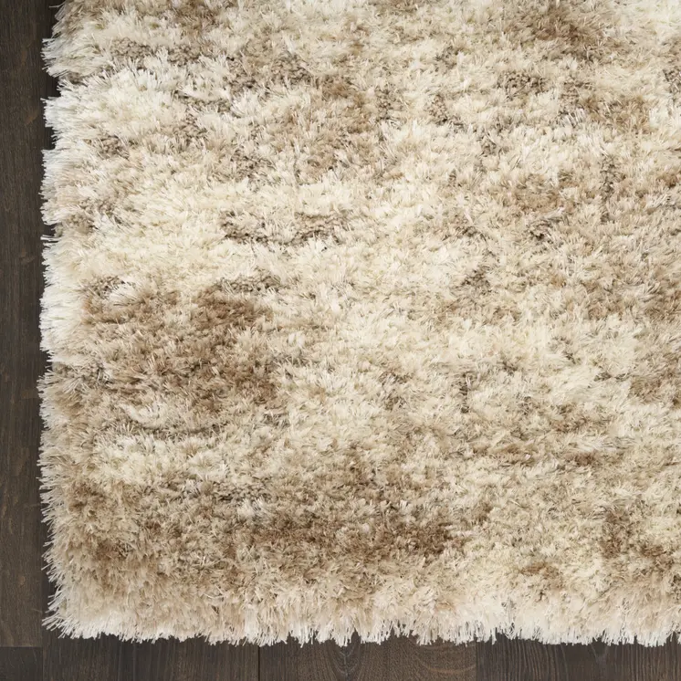 5' X 7' Beige and Ivory Abstract Shag Area Rug
