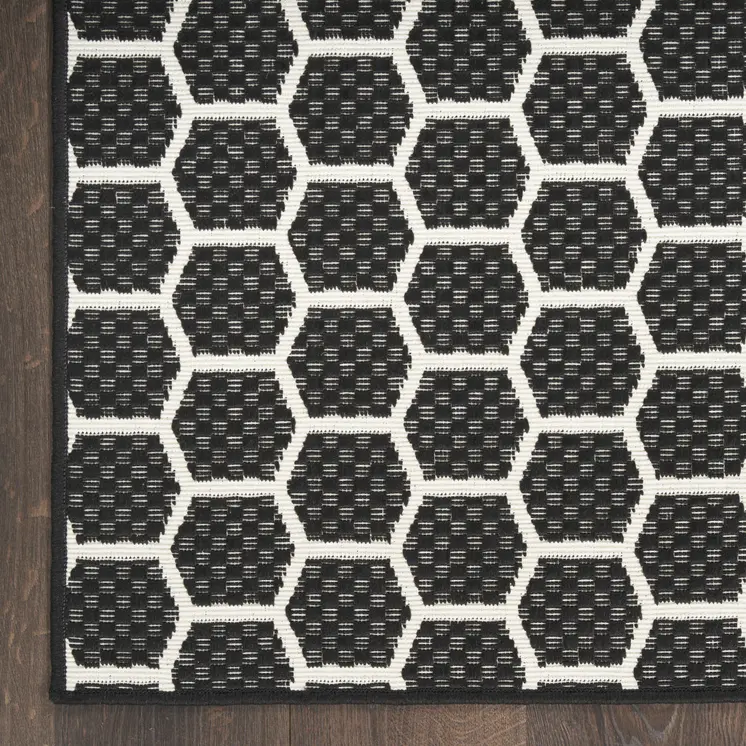 12' Black And Ivory Geometric Indoor Outdoor Runner Rug