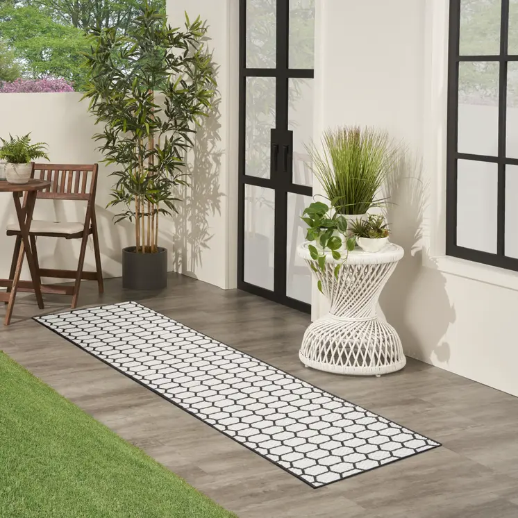 12' Black And Ivory Geometric Indoor Outdoor Runner Rug