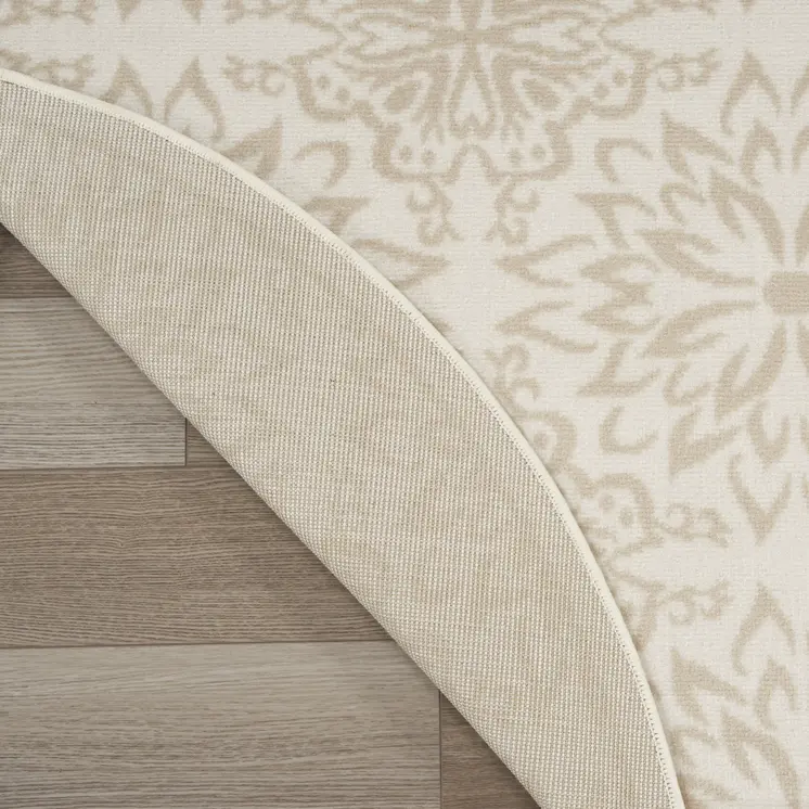 8' Beige and Ivory Floral Non Skid Round Rug