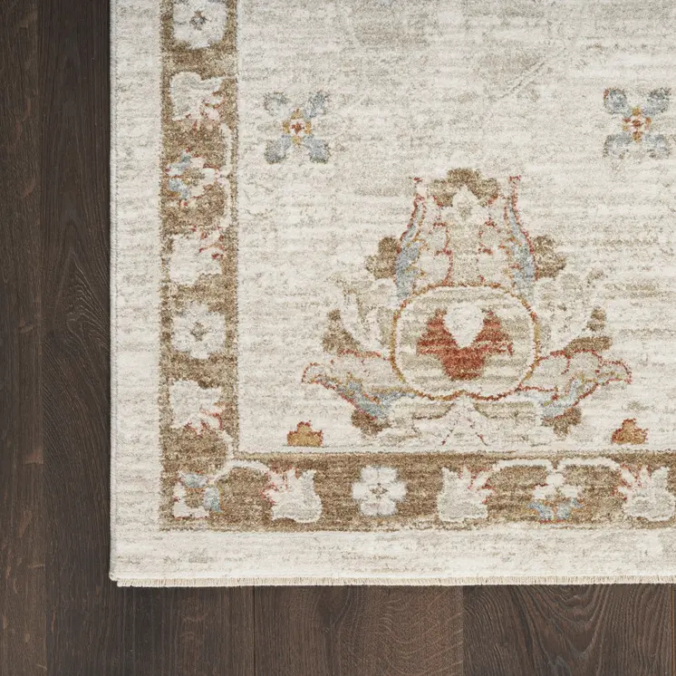 8' X 10' Cream Floral Power Loom Distressed Area Rug With Fringe