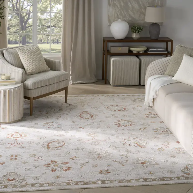 8' X 10' Cream Floral Power Loom Distressed Area Rug With Fringe