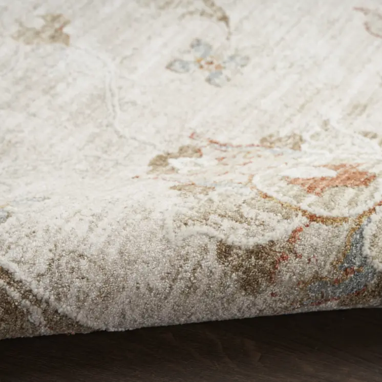 8' X 10' Cream Floral Power Loom Distressed Area Rug With Fringe