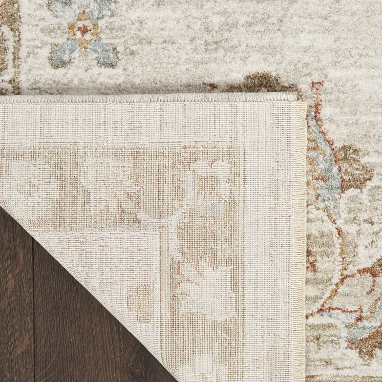 9' X 13' Cream Floral Power Loom Distressed Area Rug With Fringe