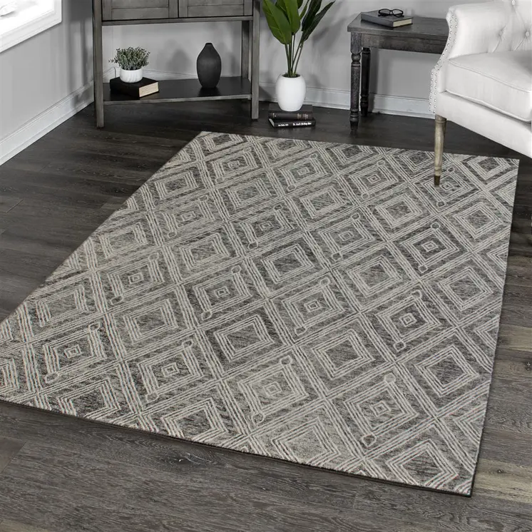 5' X 8' Black and Ivory Wool Abstract Geometric Hand Tufted Non Skid Area Rug