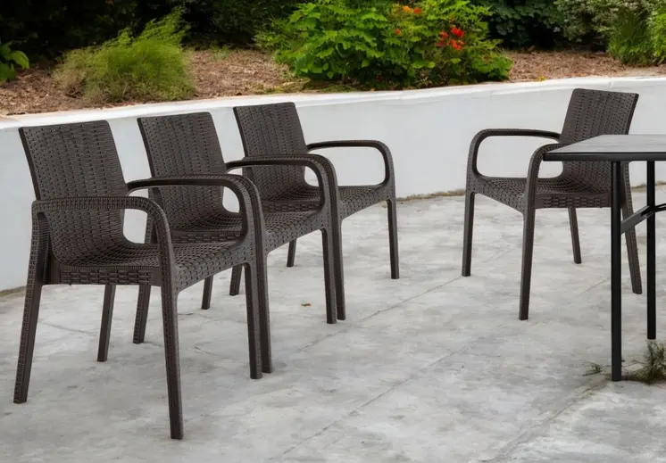 Set of Four 24" Brown Faux Rattan Heavy Duty Plastic Outdoor Stacking Arm Chairs