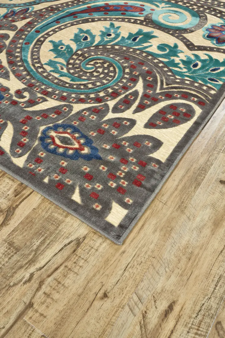 8' X 11' Tan Blue and Taupe Paisley Power Loom Area Rug