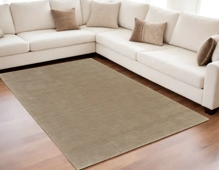 5' X 8' Tan Wool Hand Woven Area Rug