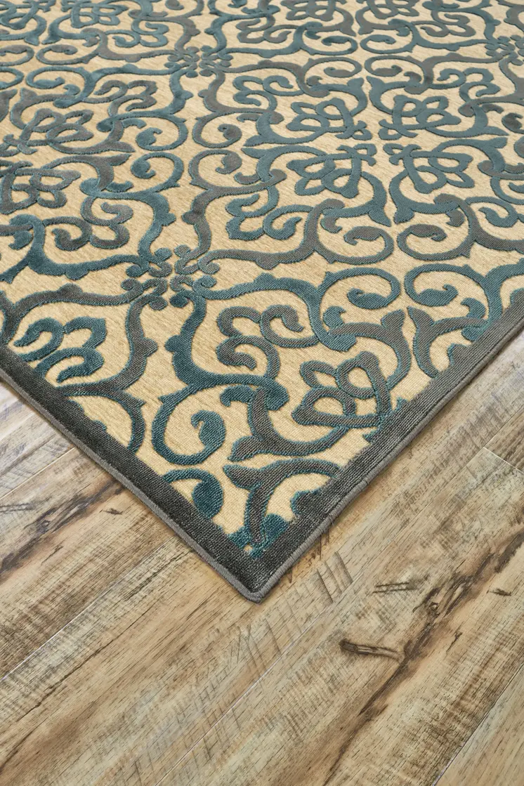 8' X 11' Tan Blue and Taupe Floral Power Loom Area Rug