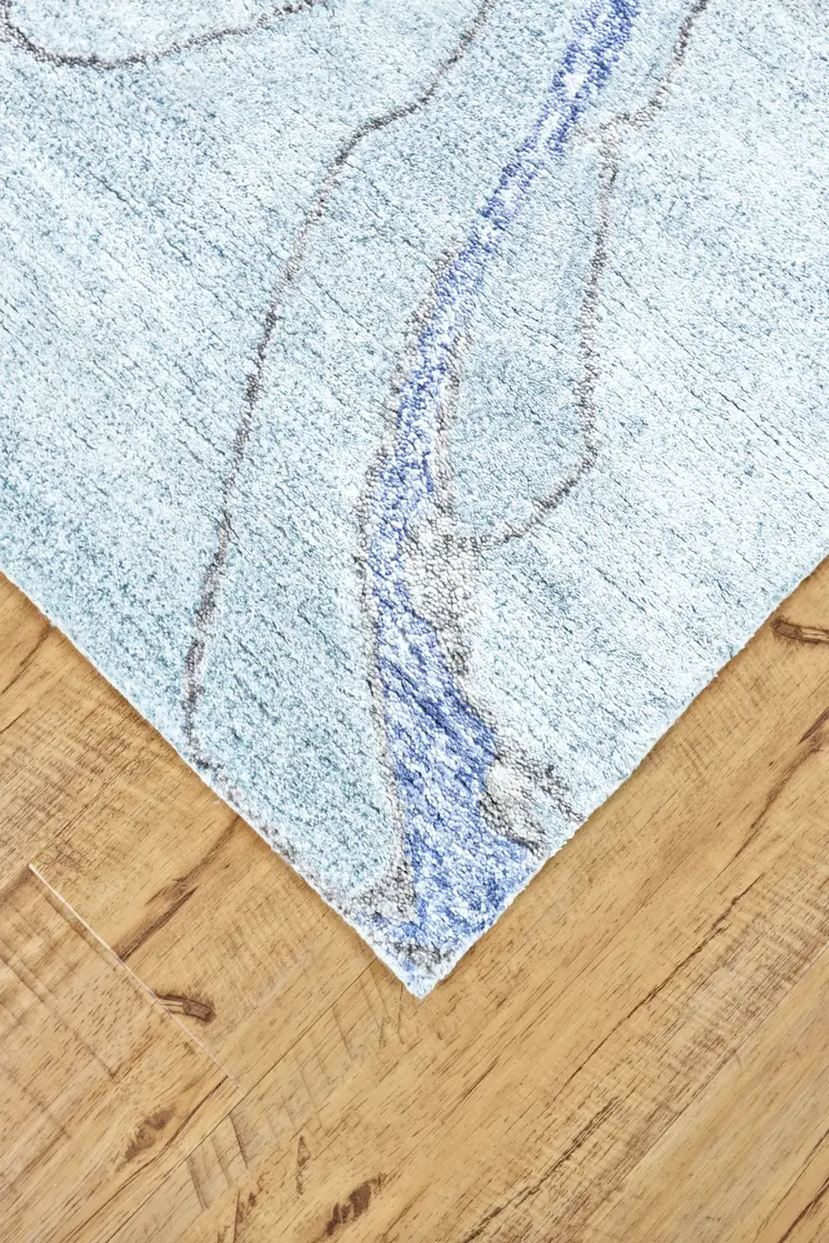 5' X 8' Blue and Ivory Abstract Hand Tufted Area Rug
