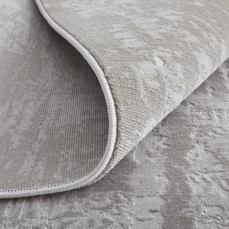 5' X 8' Taupe and Ivory Abstract Power Loom Worn Faded Area Rug