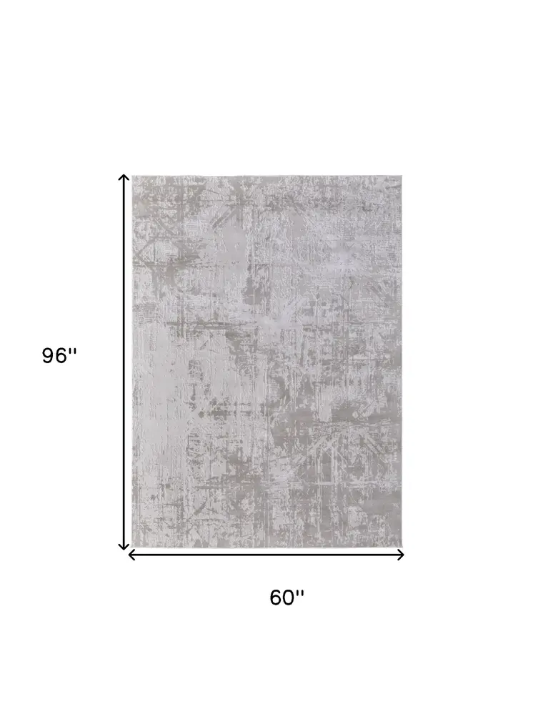 5' X 8' Taupe and Ivory Abstract Power Loom Worn Faded Area Rug