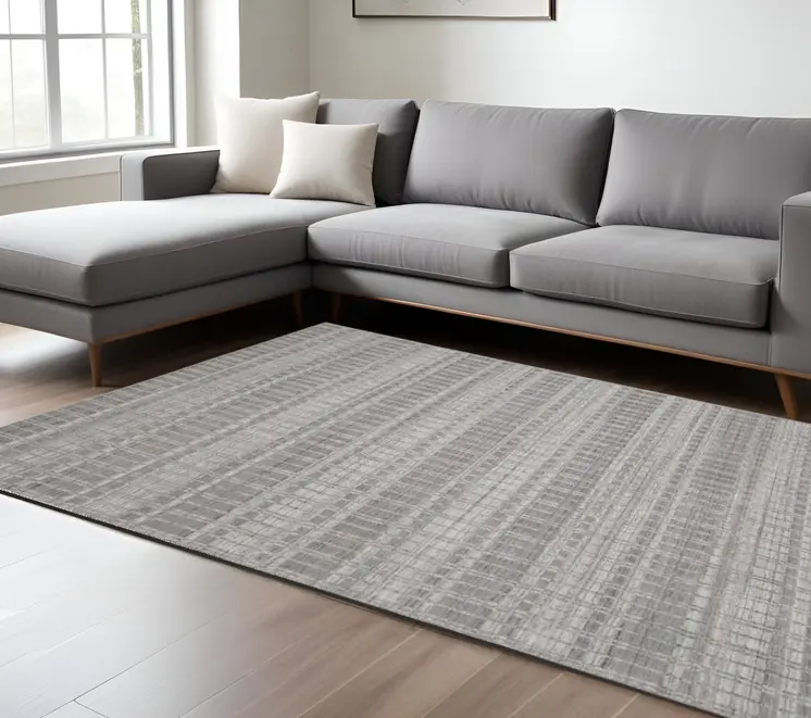 7' X 9' Gray and Ivory Geometric Hand Woven Area Rug
