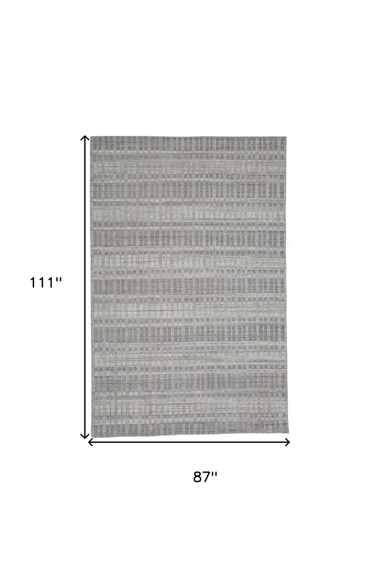 7' X 9' Gray and Ivory Geometric Hand Woven Area Rug