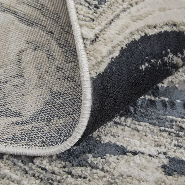 8' X 10' Ivory Black and Taupe Abstract Power Loom Area Rug