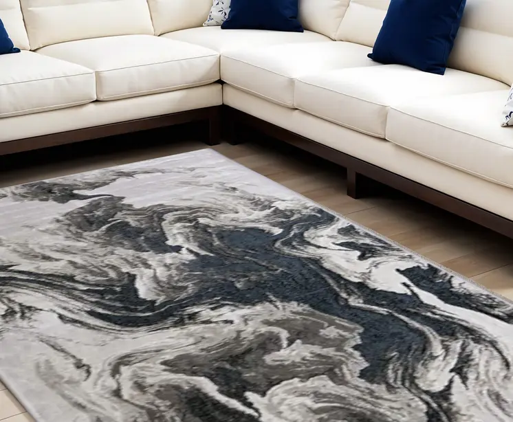 7' X 10' Ivory Black and Taupe Abstract Power Loom Area Rug