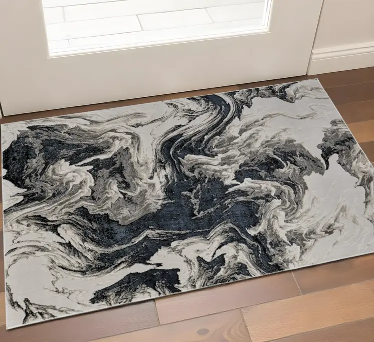 2' X 3' Ivory Black And Taupe Abstract Area Rug