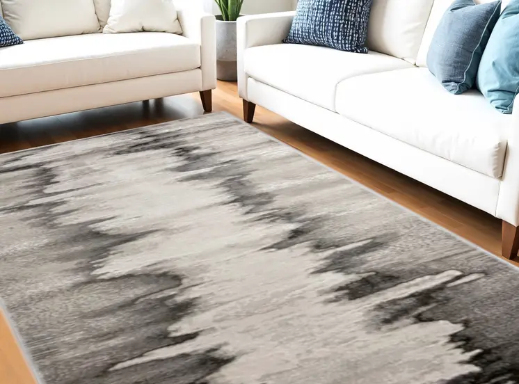 5' X 8' Gray Ivory and Taupe Abstract Power Loom Area Rug