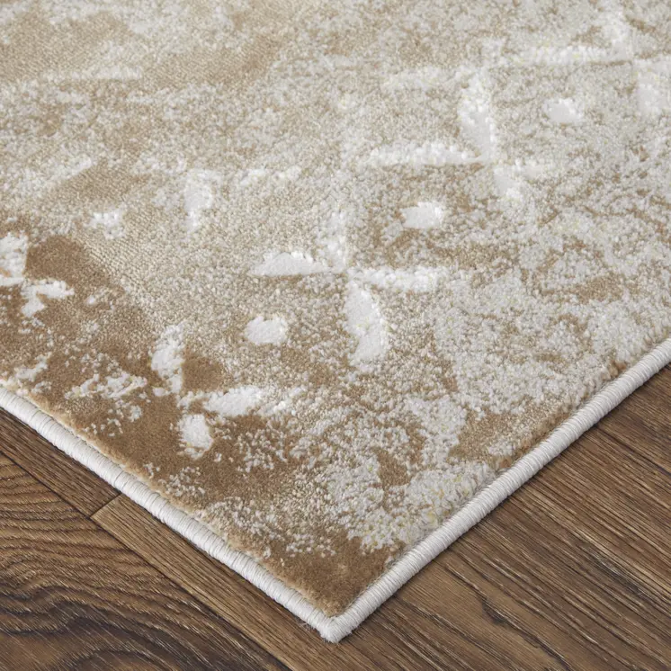 7' X 10' Tan and Ivory Abstract Power Loom Worn Faded Area Rug