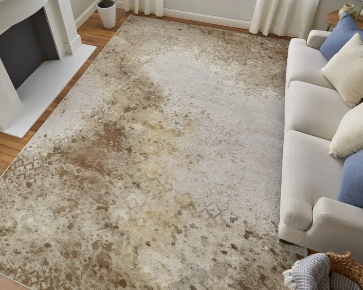 2' X 3' Tan and Ivory Abstract Power Loom Worn Faded Area Rug
