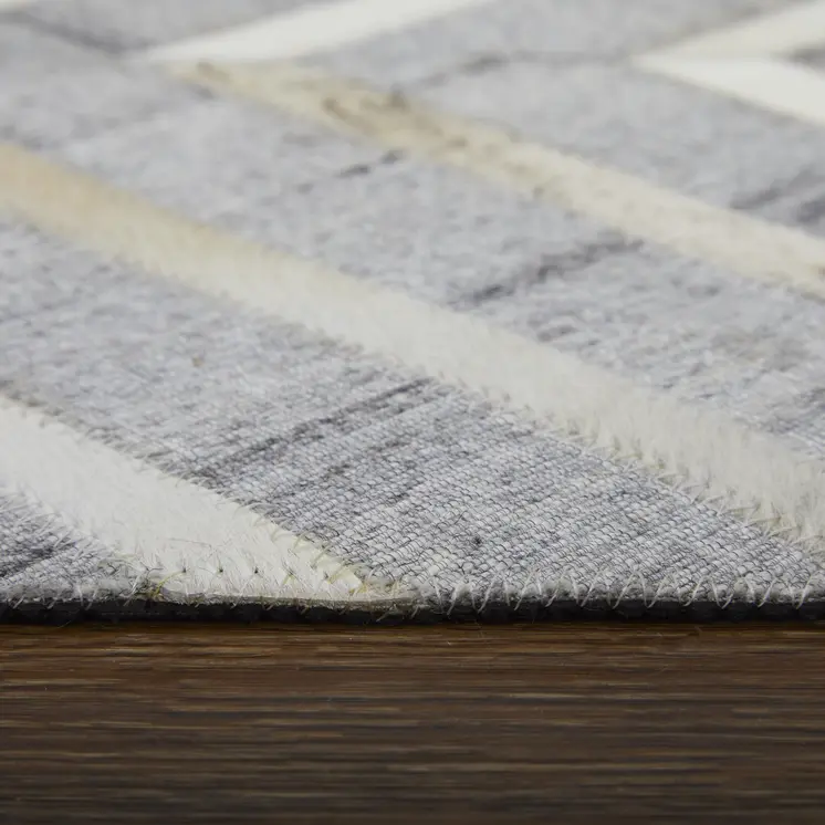5' X 8' Gray and Ivory Geometric Hand Woven Area Rug