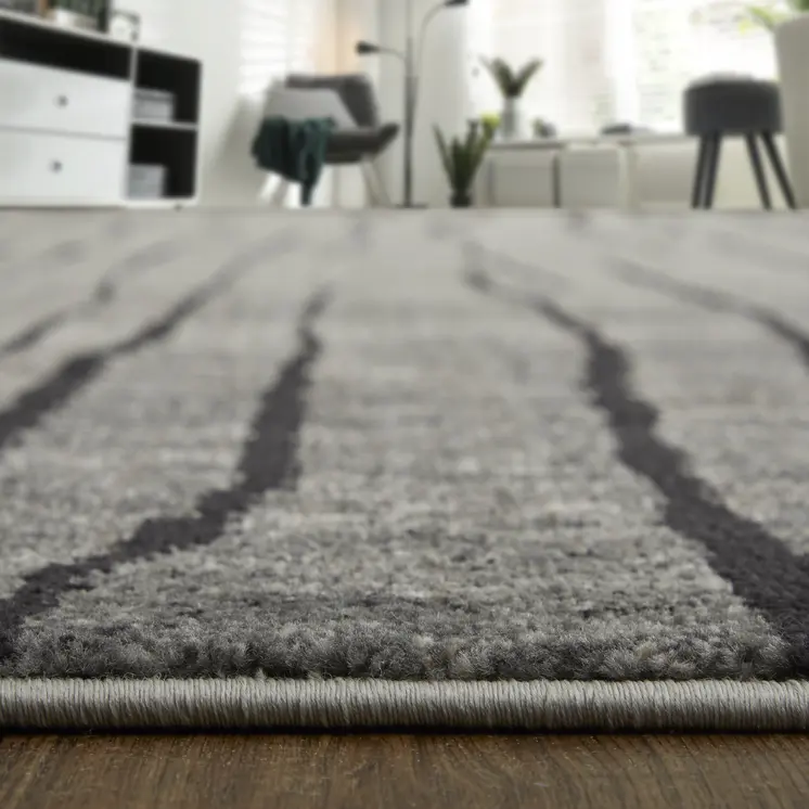 4' X 6' Gray and Black Abstract Power Loom Area Rug