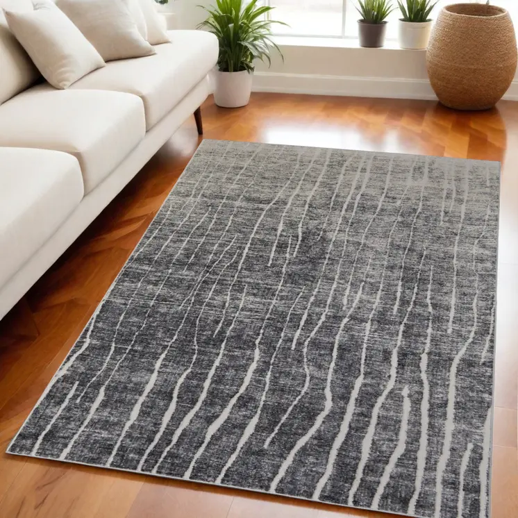 5' X 8' Ivory Gray and Black Abstract Power Loom Area Rug