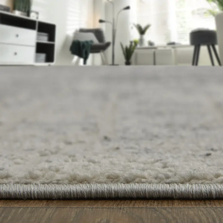 7' X 10' Ivory Gray and Black Abstract Power Loom Area Rug