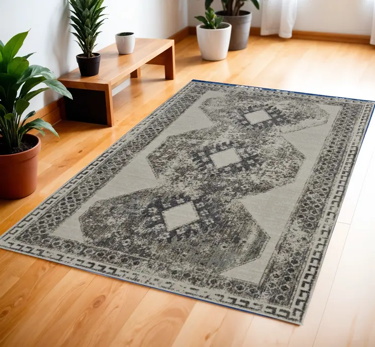 4' X 6' Gray and Ivory Abstract Power Loom Worn Faded Area Rug