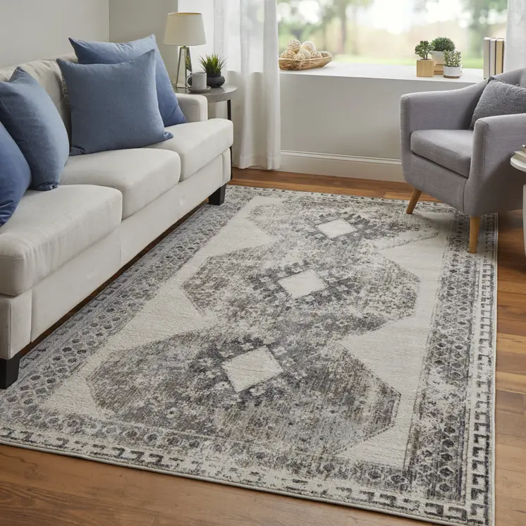 5' X 8' Gray and Ivory Abstract Power Loom Worn Faded Area Rug