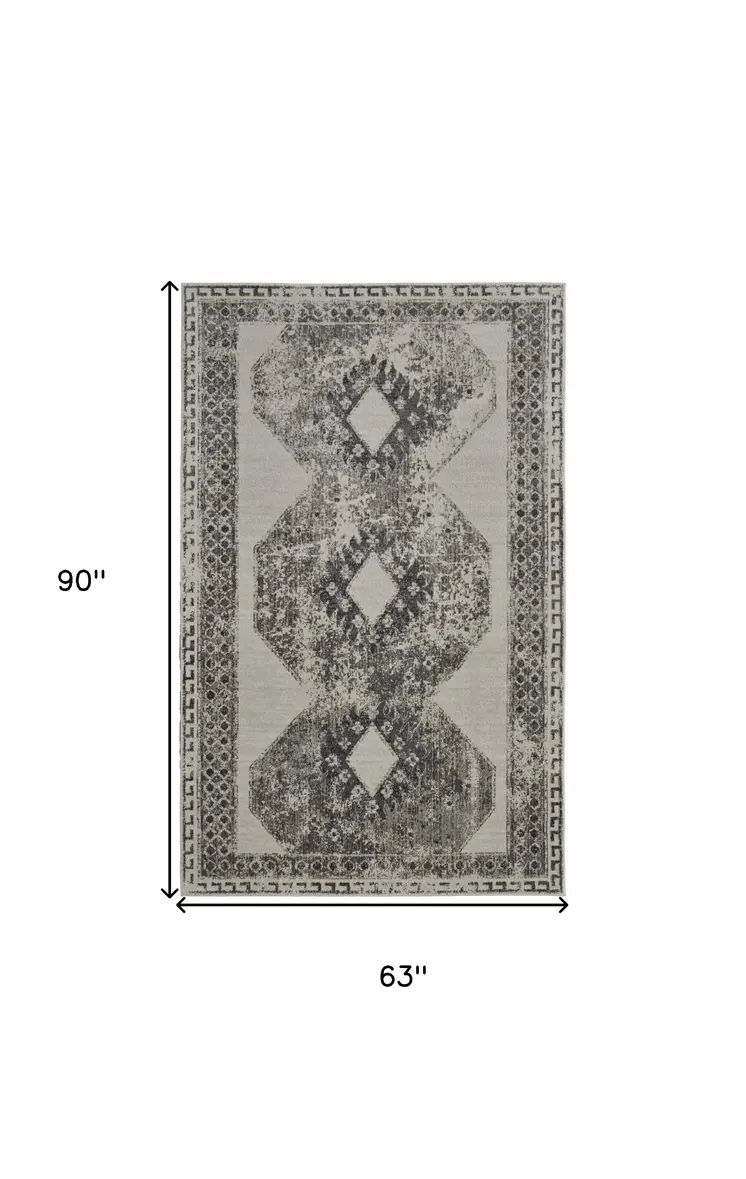 5' X 8' Gray and Ivory Abstract Power Loom Worn Faded Area Rug