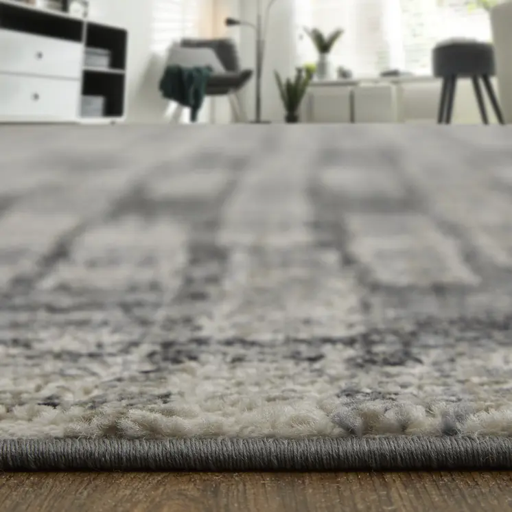 7' X 10' Gray and Black Geometric Power Loom Worn Faded Area Rug