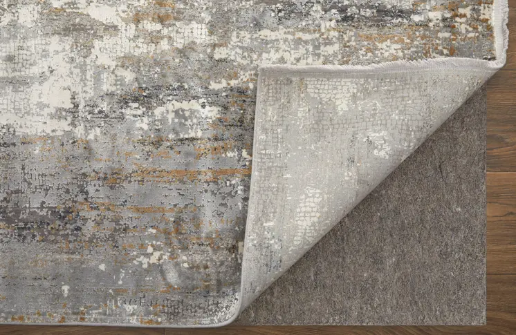 3' X 5' Gray Ivory and Gold Abstract Power Loom Area Rug With Fringe