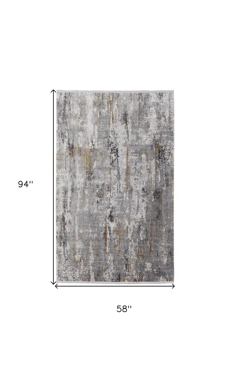 5' X 8' Gray Ivory and Gold Abstract Power Loom Area Rug With Fringe