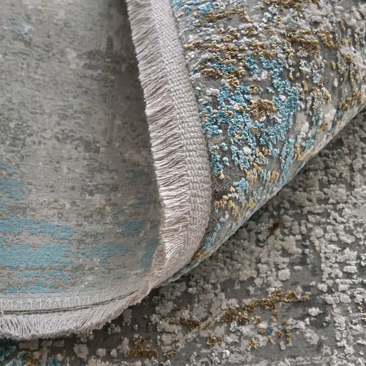 5' X 8' Ivory Gray and Blue Abstract Power Loom Area Rug With Fringe