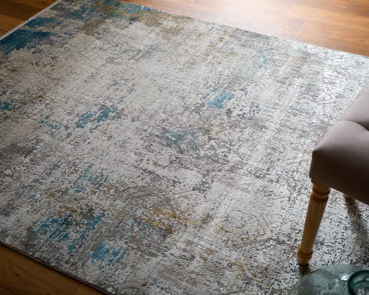 7' X 10' Ivory Gray and Blue Abstract Power Loom Area Rug With Fringe