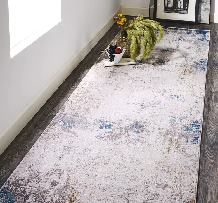 10' Ivory Gray and Blue Abstract Power Loom Runner Rug With Fringe