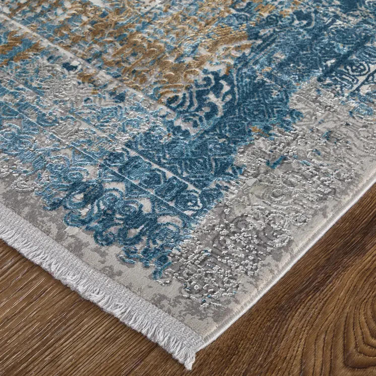 7' X 10' Blue Gold and Gray Abstract Power Loom Area Rug With Fringe