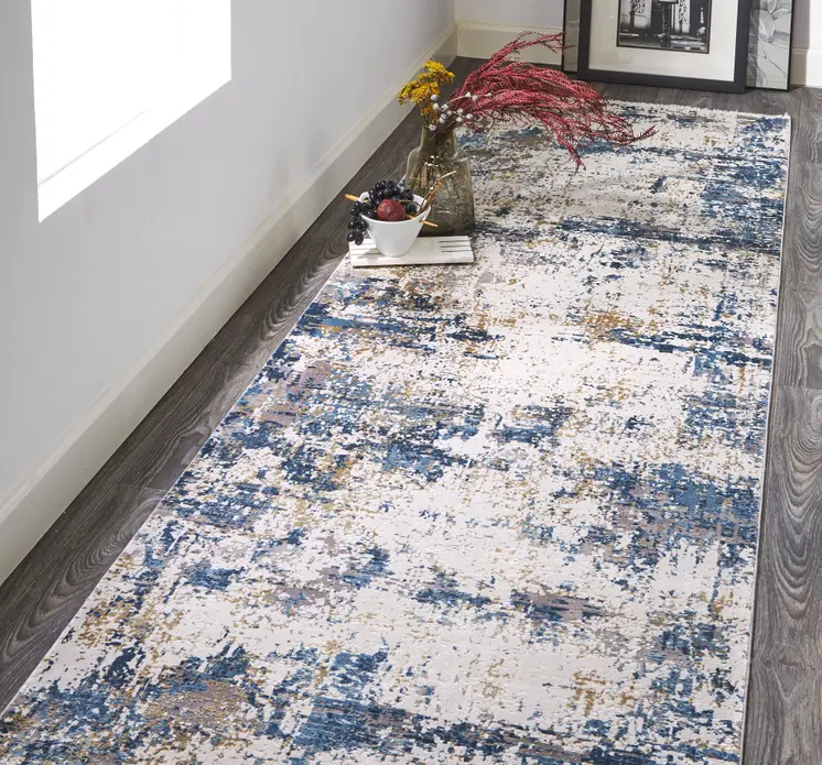 10' Ivory Tan and Blue Abstract Power Loom Runner Rug With Fringe