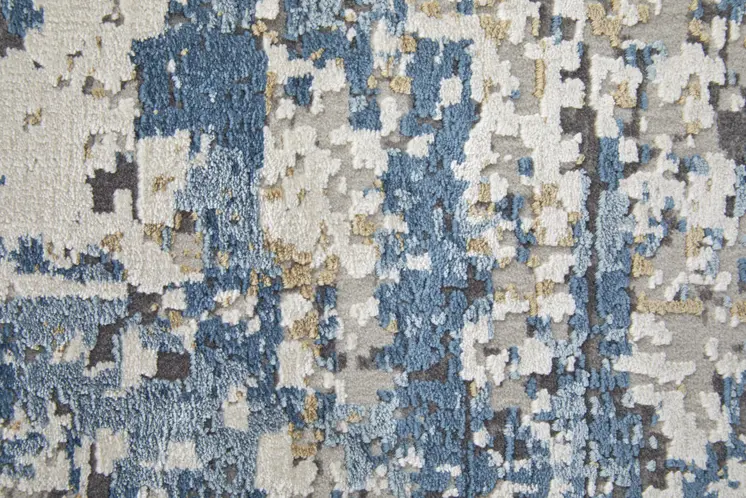 13' X 20' Ivory Tan and Blue Abstract Power Loom Area Rug With Fringe