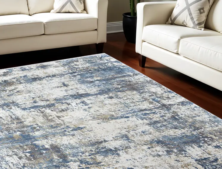 13' X 20' Ivory Tan and Blue Abstract Power Loom Area Rug With Fringe