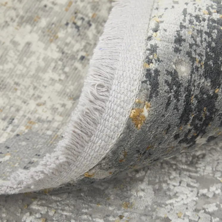 2' X 3' Ivory Taupe and Gray Abstract Power Loom Distressed Area Rug With Fringe