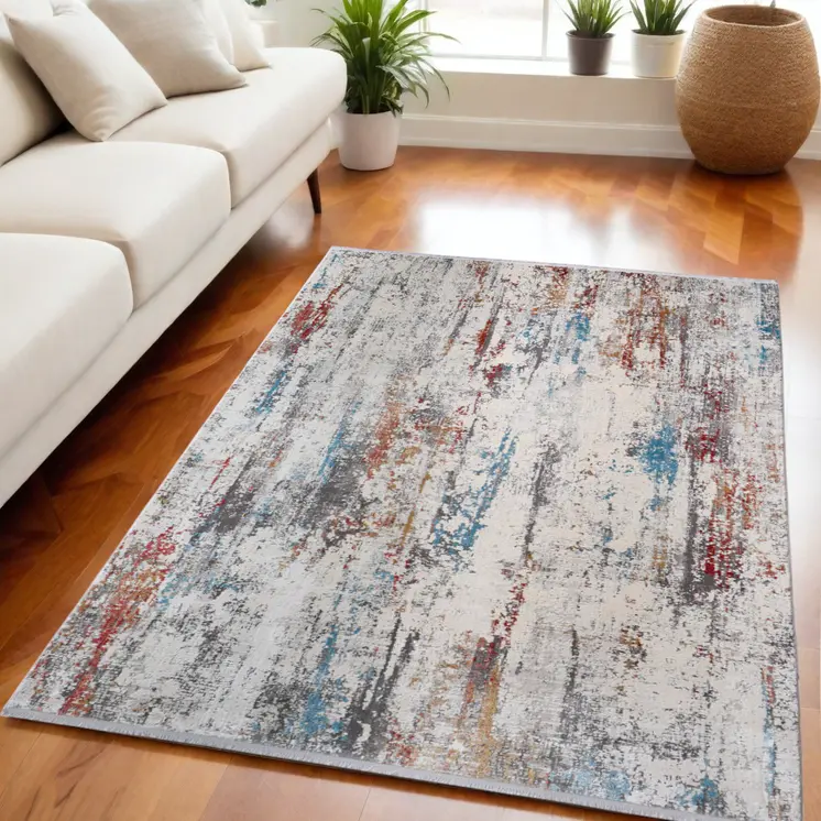 5' X 8' Gray Blue and Red Abstract Power Loom Area Rug With Fringe