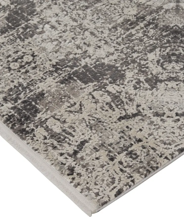 5' X 8' Ivory Taupe and Gray Abstract Power Loom Distressed Area Rug With Fringe