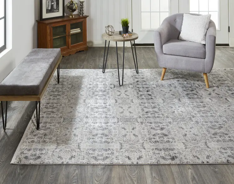 2' X 3' Ivory Taupe and Gray Oriental Power Loom Area Rug With Fringe